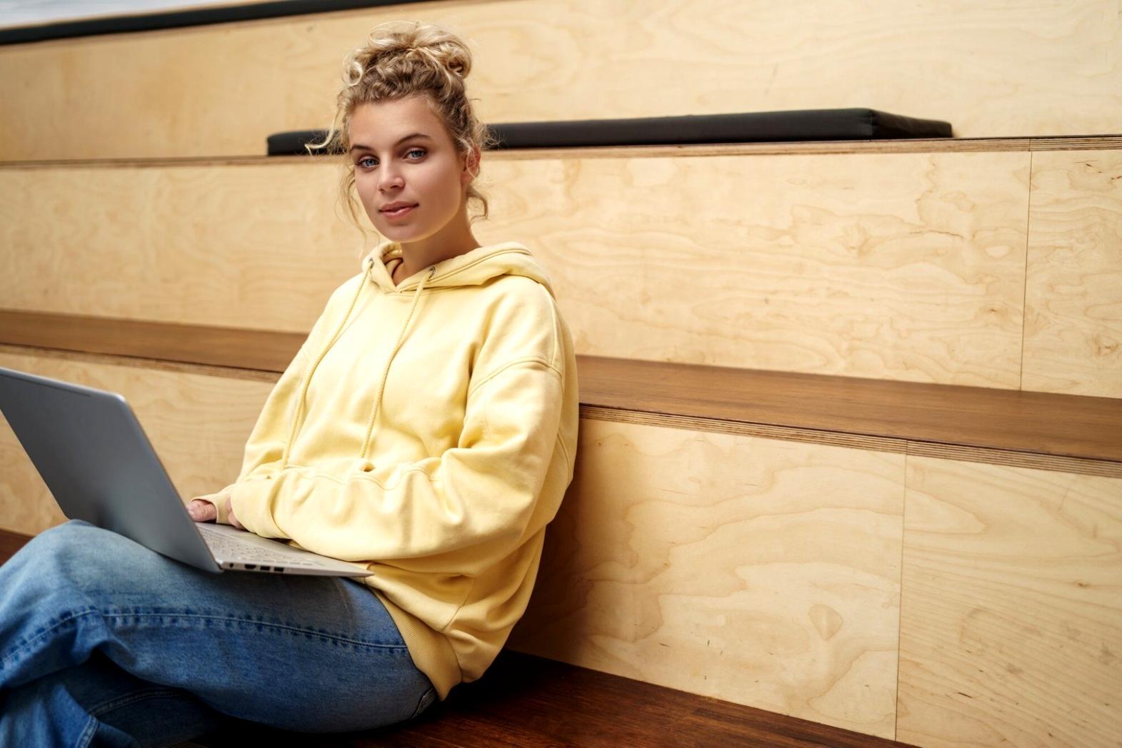 Person analyzing financial charts and budget spreadsheets on desk